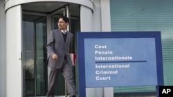 Netzai Sandoval, a Mexican human rights lawyer, leaves the ICC building after filing a complaint with the International Criminal Court in The Hague, November 25, 2011.