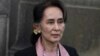 Suu Kyi Sentenced to Four Years on Two Charges