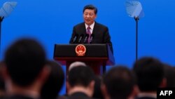 China's President Xi Jinping speaks at a press conference at the end of the final day of the Belt and Road Forum at the China National Convention Centere at the Yanqi Lake venue, outside Beijing, April 27, 2019.