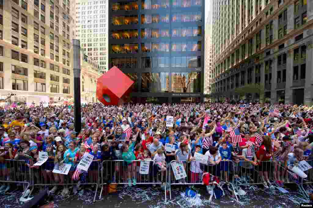 Fans watch the ticker-tape parade to celebrate the United States&#39; Women&#39;s World Cup championship, in New York City, July 10, 2015. (Robert Deutsch-USA TODAY Sports)