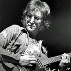 In this Aug. 30, 1972 file photo, John Lennon performs at New York's Madison Square Garden.