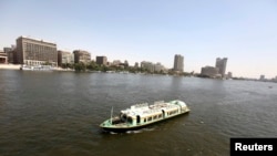 A boat cruises in the Egyptian Nile River in Cairo, May 28, 2013.