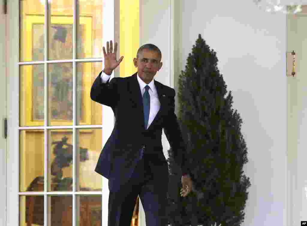 President Barack Obama waves as he leaves the Oval Office of the White House in Washington, Jan. 20, 2017, before the start of presidential inaugural festivities for the incoming 45th President of the United States Donald Trump. 