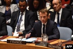 French President Emmanuel Macron speaks during the United Nations Security Council briefing on counterproliferation at the United Nations in New York on the second day of the UN General Assembly, Sept. 26, 2018.