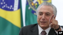 FILE - The administration of Brazilian President Michel Temer has been cautious in reacting to the U.S. election, but officials have acknowledged that the country's incipient recovery could suffer if Donald Trump makes good on his promises to limit trade.