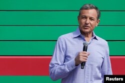 FILE - Disney's Chief Executive Officer Bob Iger attends the opening event of Disney-Pixar Toy Story Land, the seventh themed land in Shanghai Disneyland in Shanghai, China, April 26, 2018.