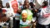 Supporters of former military leader, Muhammadu Buhari, and presidential aspirant, chant slogans during the All Progressive Congress party convention in Lagos, Nigeria,Wednesday, Dec. 10, 2014. 