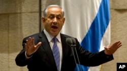 Israeli Prime Minister Benjamin Netanyahu speaks during a session of the Knesset, Israel's parliament, in Jerusalem, Oct. 27, 2014.