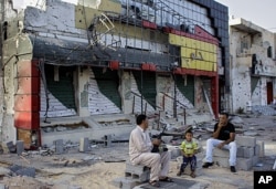 Comme ce quartier de Misrata, beaucoup de communautés libyennes ont subi des dégâts énormes durant l'insurrection