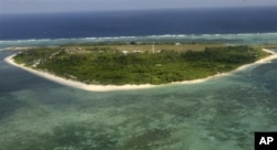 Salah satu pulau di Kepulauan Spratly di Laut China Selatan yang dipersengketakan China dan Filipina. (Foto: AP)