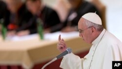 FILE - Pope Francis delivers his speech during a meeting marking the 50th anniversary of the creation of the Synod of Bishops, in the Paul VI hall at the Vatican, Saturday, Oct. 17, 2015. 