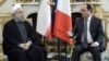 پیرس: ایرانی صدر کے اربوں ڈالر کے سمجھوتوں پر دستخط 