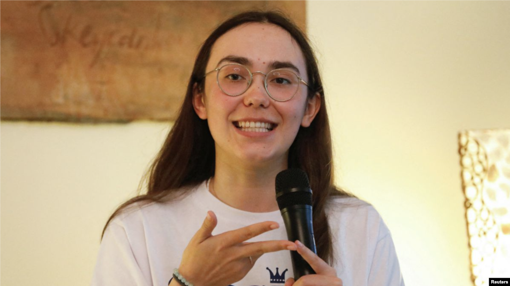 Belgian-British pilot Zara Rutherford, 19, gestures as she speaks during a conference at a Belgian ambassador's residence in Jakarta, Indonesia, December 22, 2021. (REUTERS/Ajeng Dinar Ulfiana)