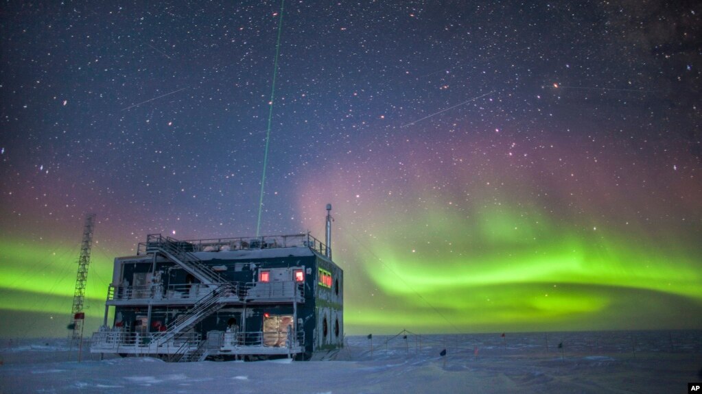 This undated photo provided by NOAA in May 2018 shows aurora australis near the South Pole Atmospheric Research Observatory in Antarctica. 