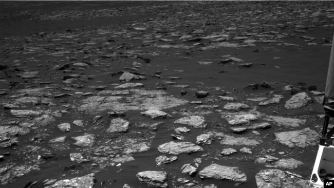 This Dec. 2, 2016 image taken by NASA's Curiosity rover shows rocky ground on the lower flank of Mount Sharp, a mountain on Mars.