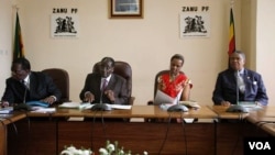 First Lady Grace Mugabe sits with the presidium at a Zanu PF meeting.