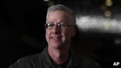 FILE - U.S. Rear Adm. Kevin Sweeney is pictured in January 2014 aboard a French aircraft carrier in the Gulf of Oman, during joint U.S.-French operations.