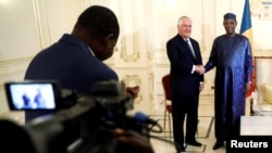 Chad's President Idriss Deby welcomes U.S. Secretary of State Rex Tillerson at the Presidential Palace in N'Djamena, Chad, March 12, 2018.