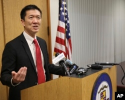 Hawaii Attorney General Douglas Chin speaks at a news conference, March 9, 2107, in Honolulu. Chin's office filed an amended lawsuit against President Donald Trump's revised travel ban.