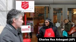 Carolyn Harper collects donations for Salvation Army in Chicago.