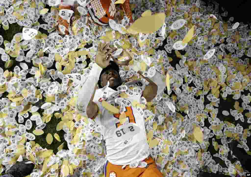 Clemson&#39;s Travis Etienne celebrates after the NCAA college football playoff championship game against Alabama, Jan. 7, 2019, in Santa Clara, California.