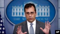 FILE - United States Citizenship and Immigration Services Director L. Francis Cissna speaks during the daily press briefing at the White House in Washington, Dec. 12, 2017. The U.S. government agency that oversees immigrants' applications to become citizens is starting an office tasked with stripping naturalized Americans of their citizenship if they cheated to get it.