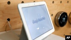 In this Oct. 9, 2018, file photo a Google Home Hub is displayed in New York. Google Assistant has made for a name for itself in a voice technology market once dominated by Amazon and Apple. (AP Photo/Richard Drew, File)