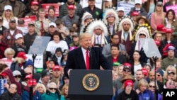 President Donald Trump speaks during a campaign rally at Bozeman Yellowstone International Airport, Nov. 3, 2018, in Belgrade, Montana. 