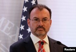 FILE - Mexican Foreign Minister Luis Videgaray listens during a news conference in Mexico City, Mexico, Feb. 2, 2018.