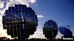 FILE - A solar panel array can be seen at the Windorah Solar Farm, which was installed by Ergon Energy, near the town of Windorah in outback Queensland, Australia, Aug. 11, 2017.