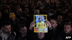 FC Nantes football club supporters gather in Nantes after it was announced that the plane Argentinian forward Emiliano Sala was flying on vanished during a flight from Nantes in western France to Cardiff in Wales, on January 22, 2019. 