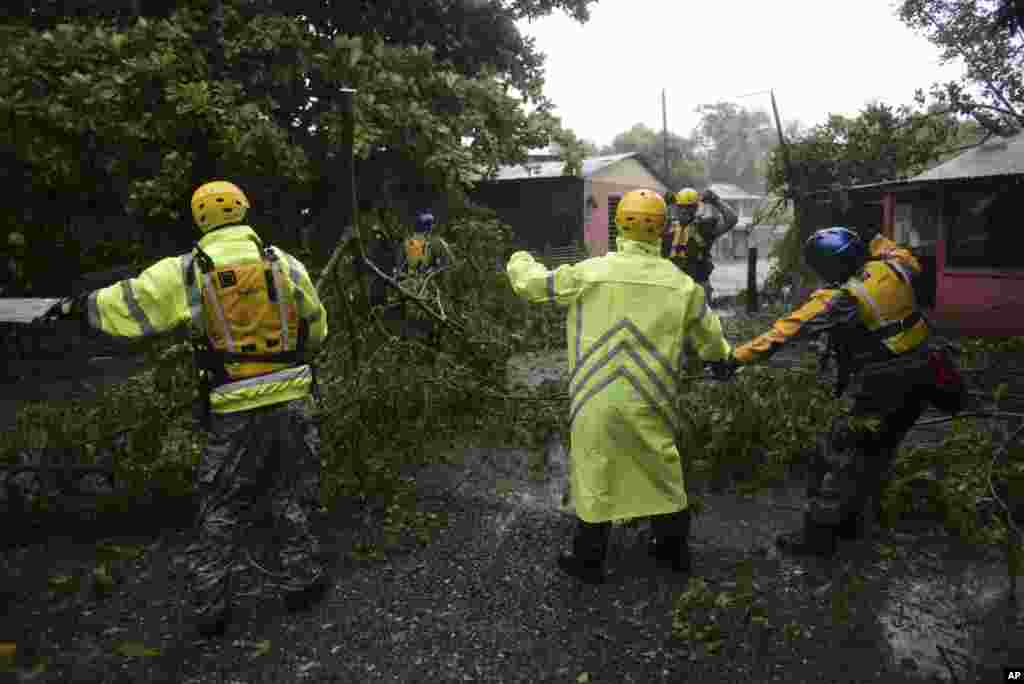 Rescuers from the Municipal Emergency Management Agency toured the streets of Matelnillo searching for anyone in distress during the passage of Hurricane Irma through the northeastern part of the island in Fajardo, Puerto Rico,, Sept. 6, 2017. 