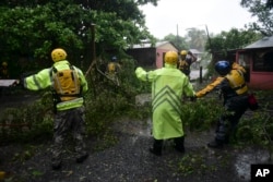 Rescuers from the Municipal Emergency Management Agency toured the streets of Matelnillo searching for anyone in distress during the passage of Hurricane Irma through the northeastern part of the island in Fajardo, Puerto Rico, Sept. 6, 2017.