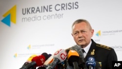 Ukrainian Defense Minister Ihor Tenyukh speaks during a news conference at a hotel in Kiev, March 17, 2014.