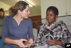 Nokuzola Ndabazonke (right) has survived a stroke, HIV and TB meningitis in Oliver Tambo District, South Africa, largely thanks to her physiotherapist, Laura Grobicki