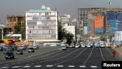 Traffic flows down a main street in Ethiopia's capital Addis Ababa, Ethiopia, Jan. 27, 2010. 
