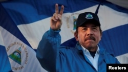 FILE - Nicaraguan President Daniel Ortega gestures during a march called "We walk for peace and life. Justice" in Managua, Nicaragua, Sept. 5,2018.