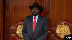 South Sudan's President Salva Kiir waits for the arrival of Eritrea's president Isaias Afwerki and Ethiopia prime minister Abiy Ahmed at the Presidential Palace in Juba, March 4, 2019. 