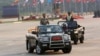 Commander-in-chief Min Aung Hlaing rides on a vehicle during a parade to mark Armed Forces Day in Myanmar's capital Naypyitaw, March 27, 2016.