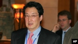 FILE - Victor Cha, at the time the U.S. National Security Council's director for Asian Affairs in the George W. Bush White House, is seen walking through a hotel lobby in Beijing, China, March 22, 2007. Cha is reportedly under consideration for the post of U.S. ambassador to Seoul.