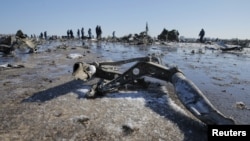 Emergencies Ministry members work at the crash site of a Boeing 737-800, Flight FZ981, operated by Dubai-based budget carrier FlyDubai, at the airport of Rostov-on-Don, Russia, March 20, 2016.