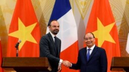 Hai vị thủ tướng Pháp và Việt Nam trong buổi họp báo chung