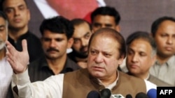 Pakistan's incoming Prime Minister Nawaz Sharif addresses his party's newly elected MPs in Lahore on May 20, 2013