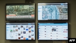 FILE - Mall of America Director of Security Major Doug Reynolds explains the social media monitoring team during a tour of Mall of America security systems in Bloomington, Minnesota, February 23, 2015. 