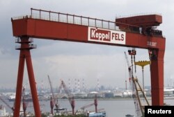 FILE - A view of a Keppel Corporation shipyard in Singapore, Jan. 19, 2016.