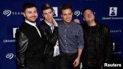 Rock band Walk The Moon poses at the 17th Annual GRAMMY Foundation Legacy Concert at the Wilshire Ebell Theater on Feb. 5, 2015, in Los Angeles.