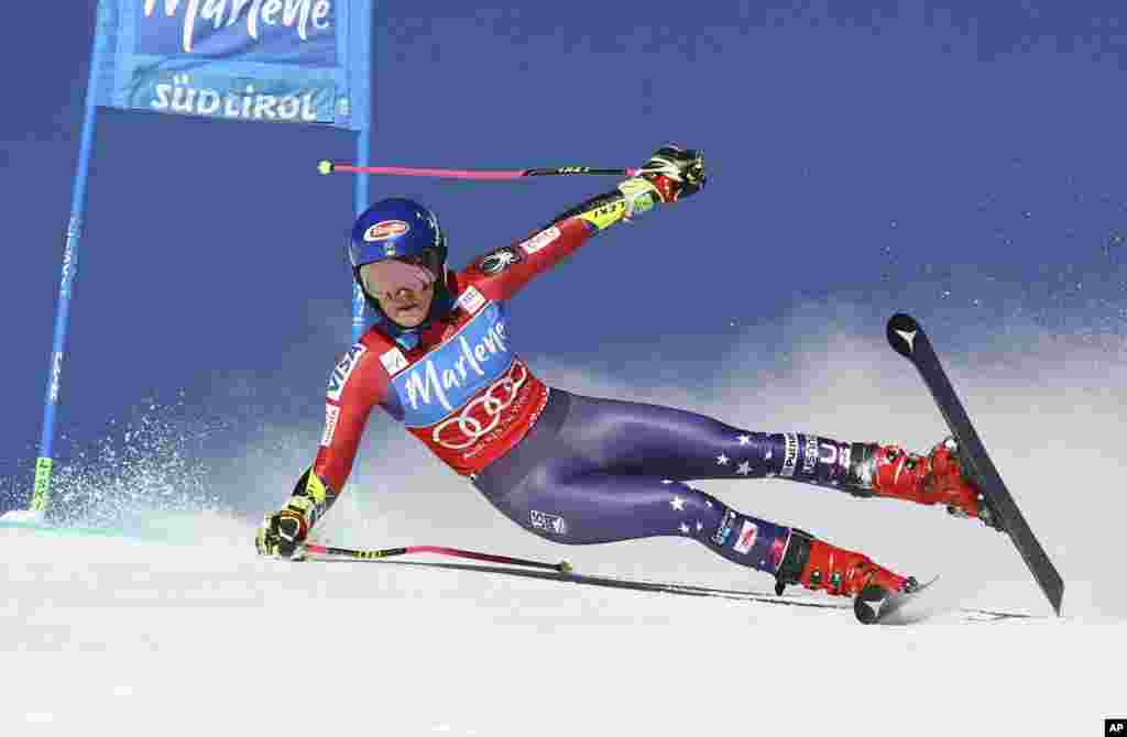 United States' Mikaela Shiffrin looses her balance as she speeds down the course during an alpine ski event at the women's World Cup giant slalom at the Kronplatz resort, in San Vigilio di Marebbe, Italy.