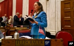 Democratic Delegate Barbara Evans Fleischauer asks a question, Aug. 13, 2018, during an impeachment hearing involving West Virginia Supreme Court justices in the House of Delegates chambers in Charleston, W.Va.