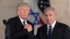 U.S. President Donald Trump, left, and Israeli Prime Minister Benjamin Netanyahu shake hands at the Israel museum in Jerusalem, May 23, 2017. 