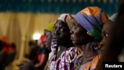 Parents of the Chibok girls attend a meeting with Nigeria's President Muhammadu Buhari at the presidential villa in Abuja, Nigeria, Jan. 14, 2016.